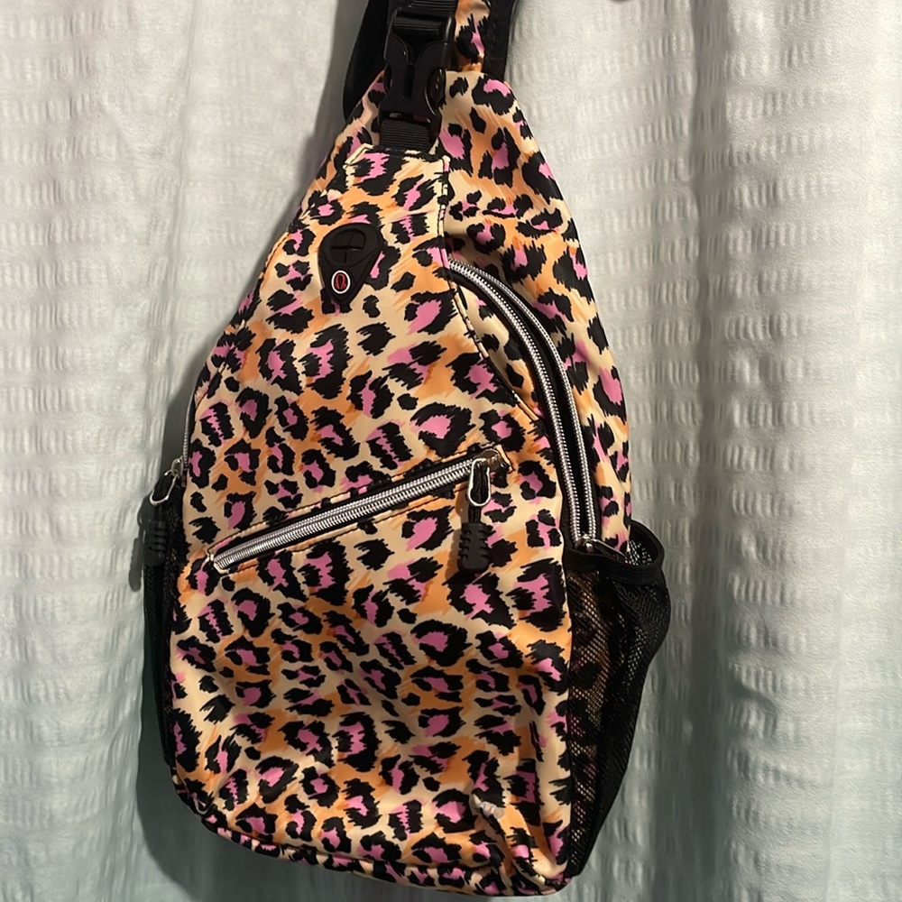 Leopard print one shoulder Back pack bag//purse NWOT